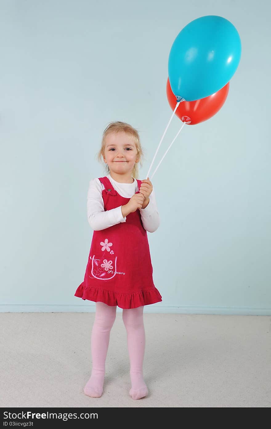 Beautiful little girl playing with balloons. Beautiful little girl playing with balloons