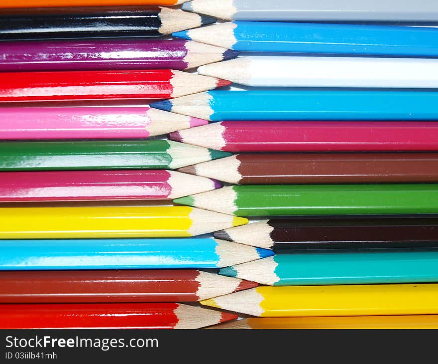 Colorful crayons on a background