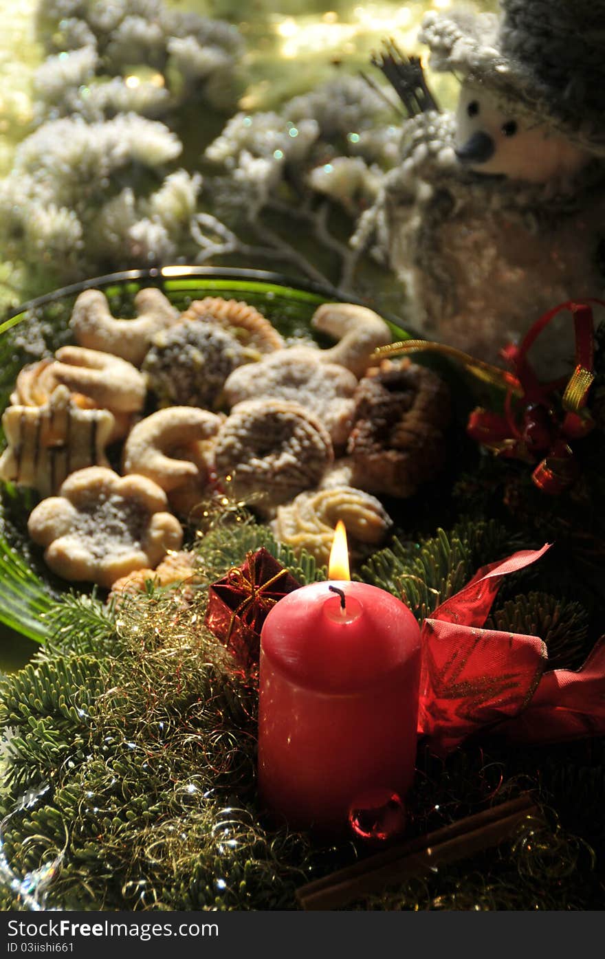 Christmas still life photo with snowman and candle. Christmas still life photo with snowman and candle