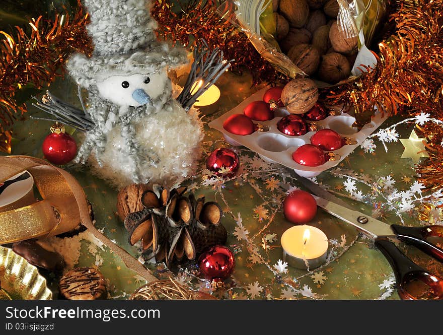 Christmas still life photo with snowman and candle. Christmas still life photo with snowman and candle