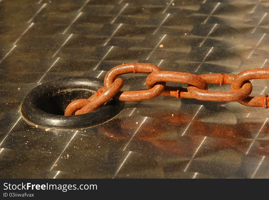 Mooring rope wrapped around cleats on deck