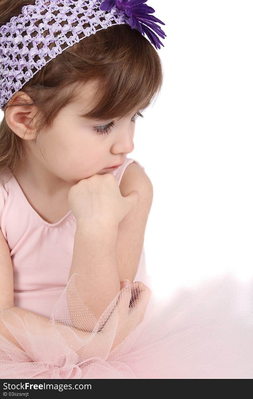 Serious brunette girl wearing a ballet tutu. Serious brunette girl wearing a ballet tutu