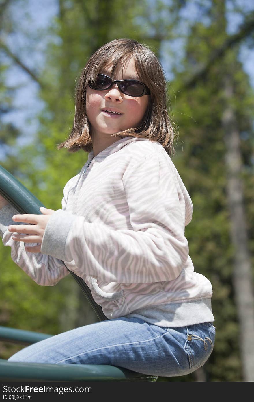 Girl On Playground Ride.