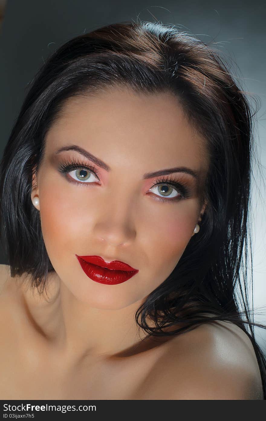 Portrait of beautiful brunette girl with beautiful red lips. Portrait of beautiful brunette girl with beautiful red lips