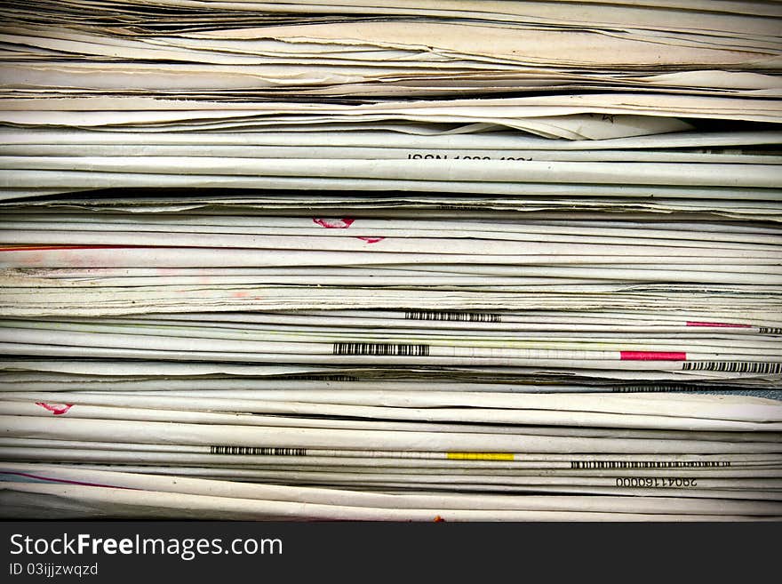 Old stack of newspapers background