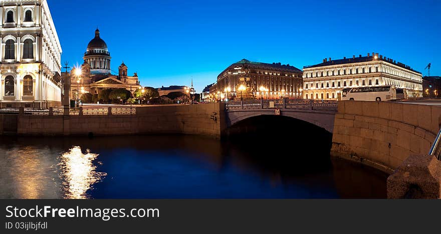 Panorama of the Isaakievsky cathedral and quay of the river of the Sink in St.-Petersburg at white nights