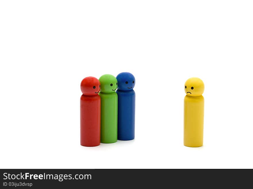 Wooden little men on white background