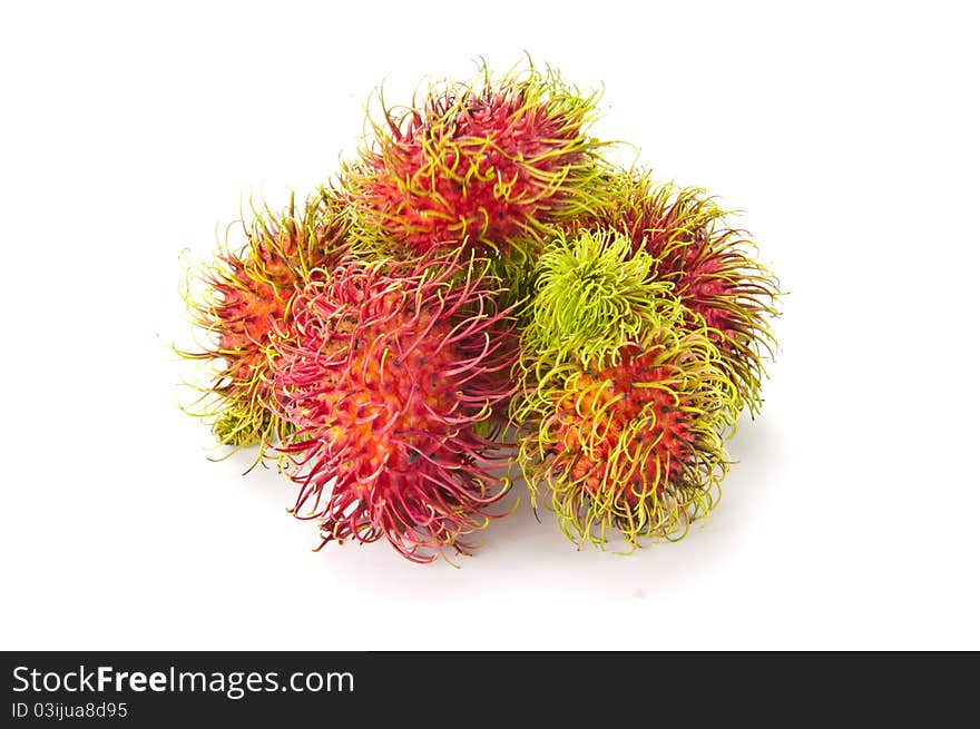 Rambutan is a tropical fruit in white background