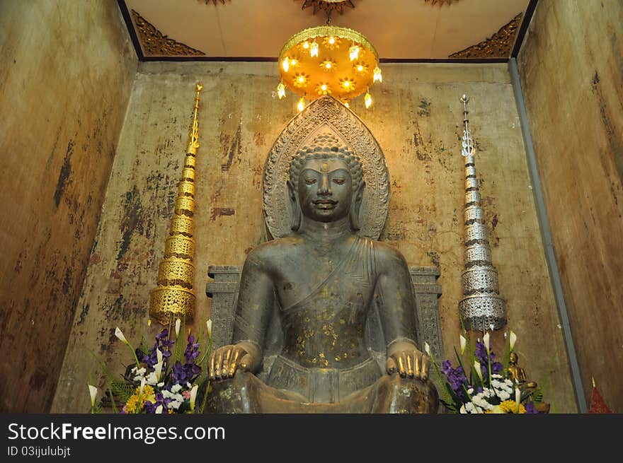 Statue of old buddha at thailand temple, Thailand