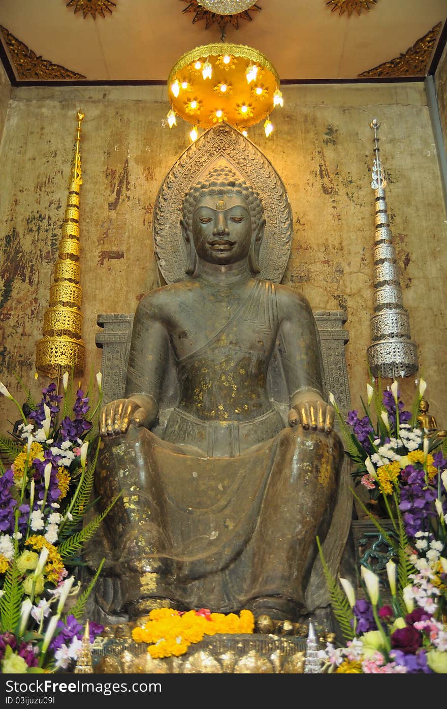 Statue of old buddha at thailand temple