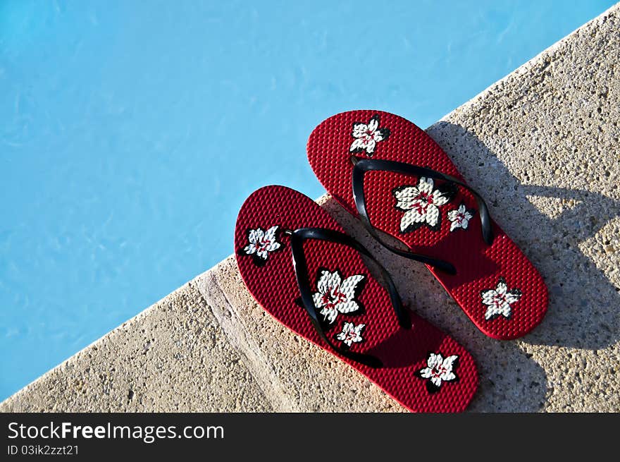 Flip-flops by the pool with great light and amazing colors