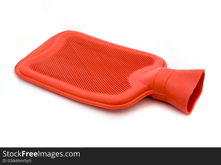 Red hot water bottle over white