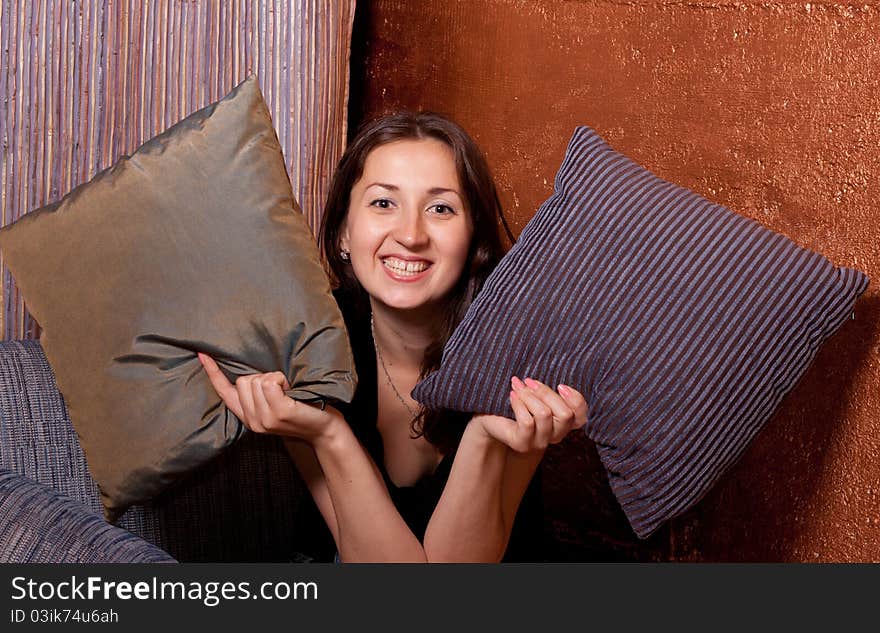 Smiling girl looks out of the bag