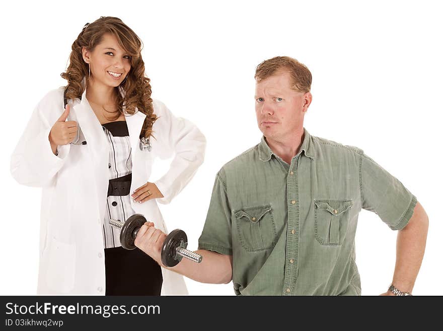 A doctor is happy with her patient using weights to work out. A doctor is happy with her patient using weights to work out.