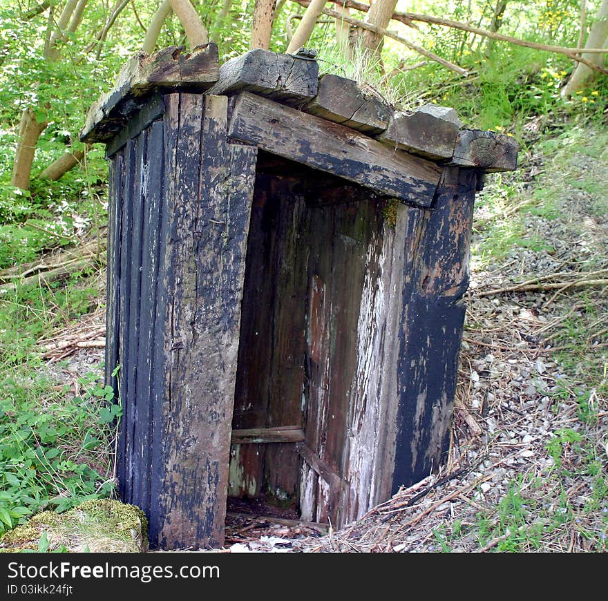 An old wooden railway hut made from sleepers. An old wooden railway hut made from sleepers