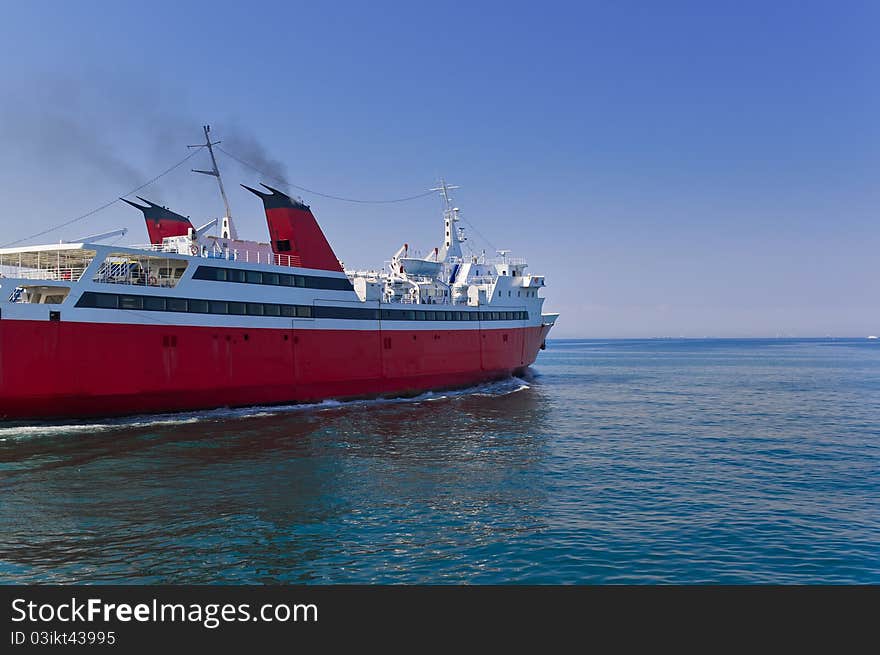 A ferry leaves the port of Piraeus