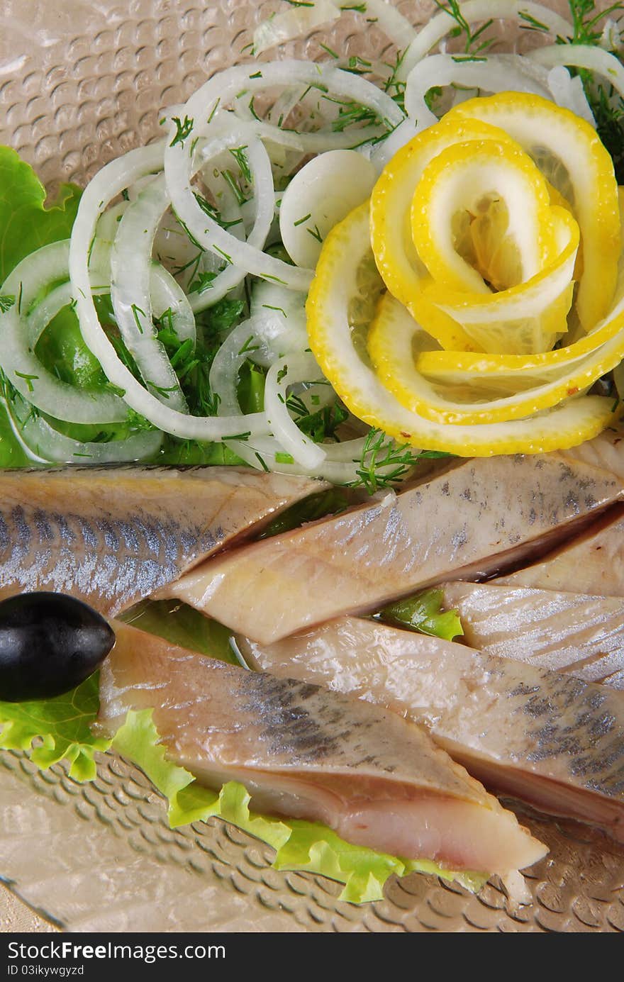 Herring fillet with onion and lemon