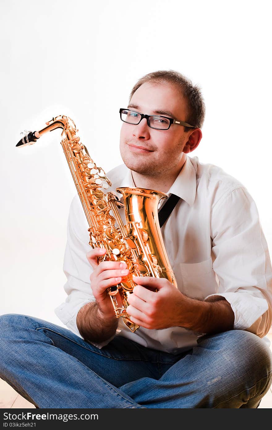 Portrait of a man with a saxophone