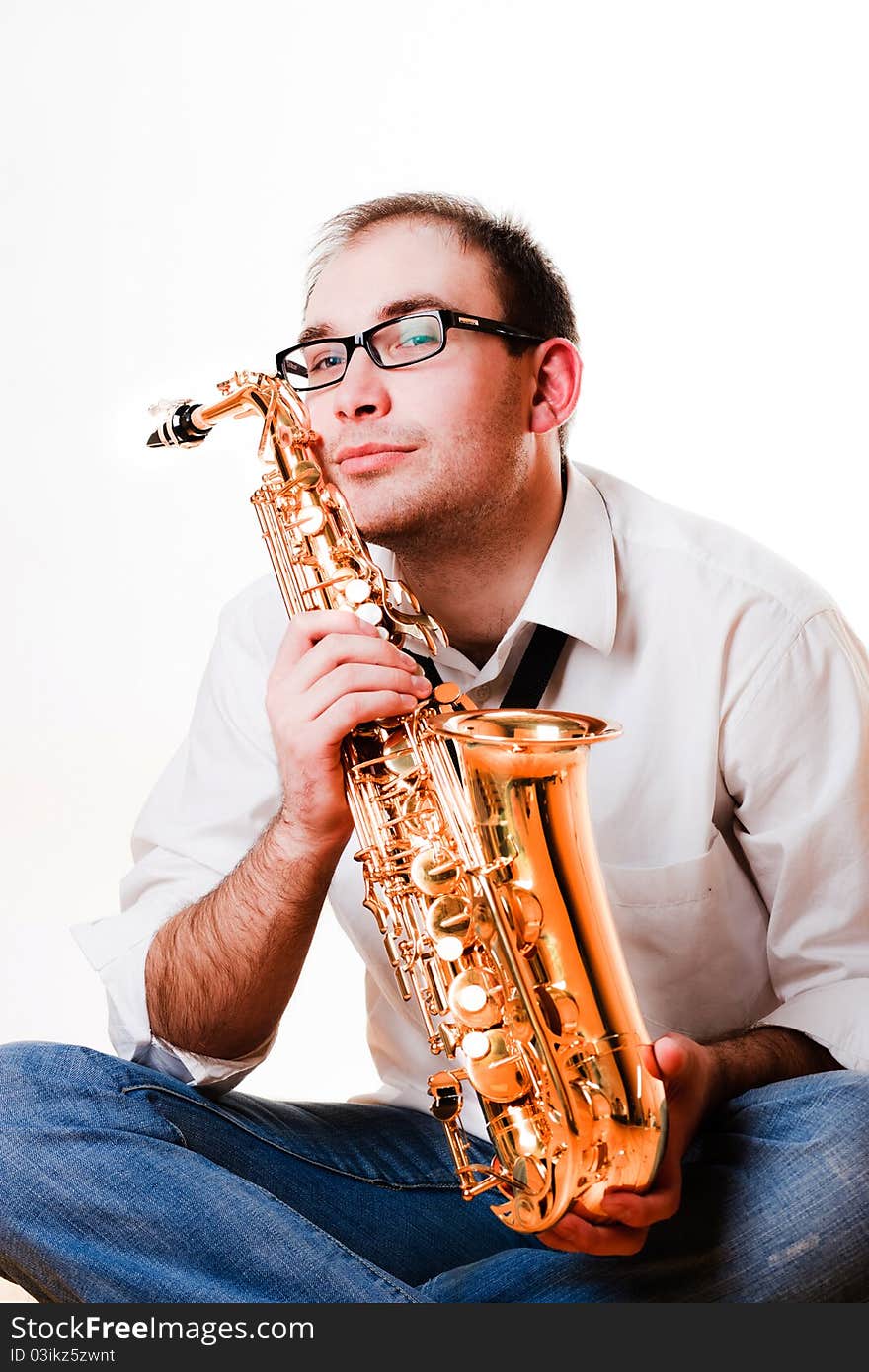 Portrait of a man with a saxophone