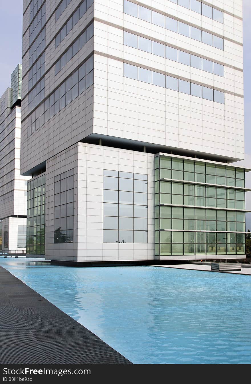 View by the swimming pool of a modern building. View by the swimming pool of a modern building