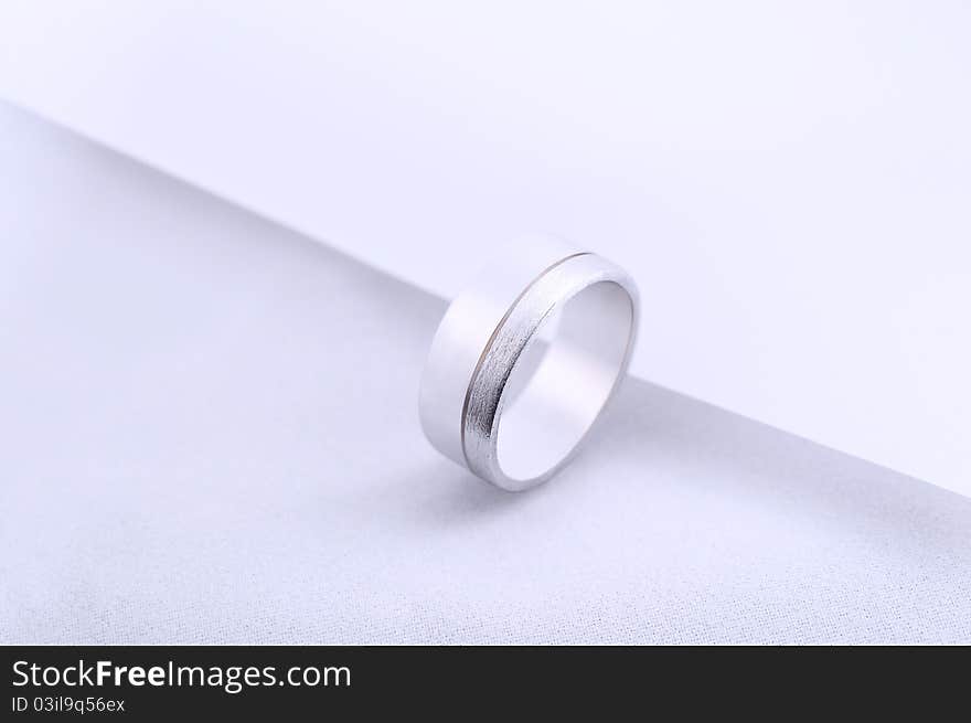 Diamond wedding rings on white background