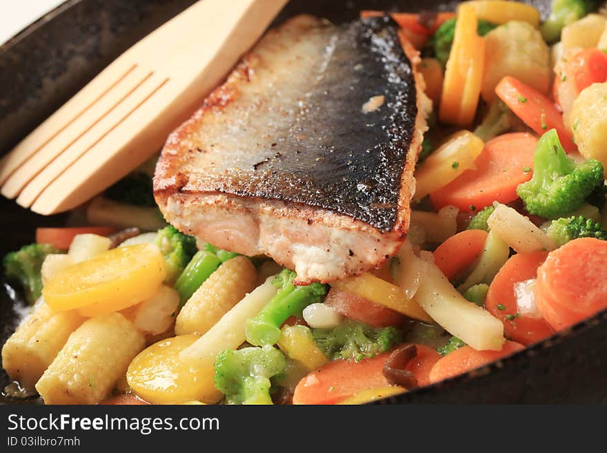 Roasted salmon trout fillet and mixed vegetables