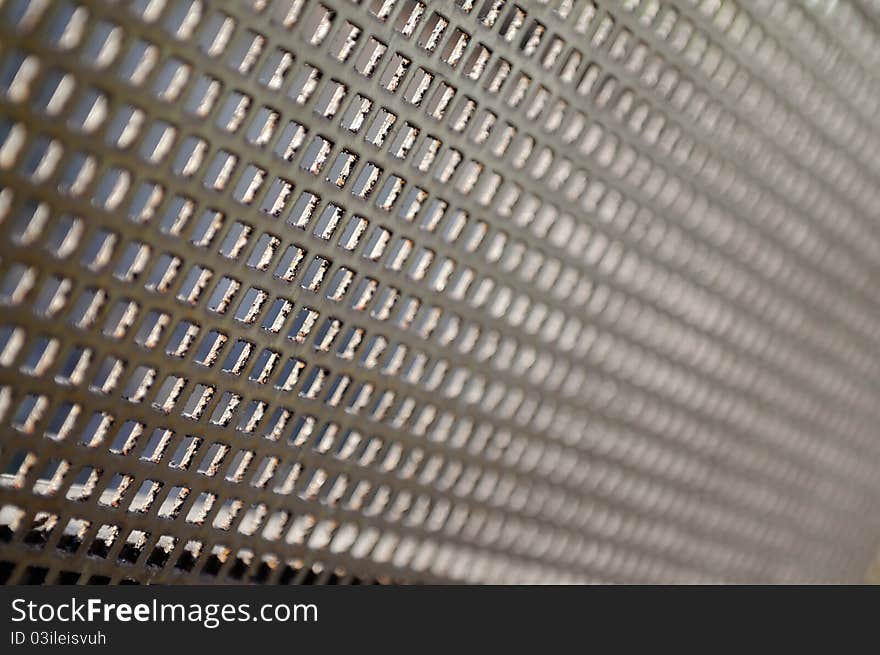 Old metal grid in perspective, short depth of field. Old metal grid in perspective, short depth of field.