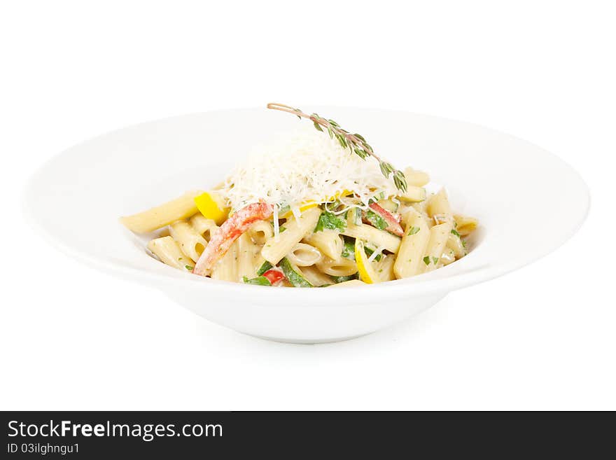 Penne with sauce in white plate isolated on white background