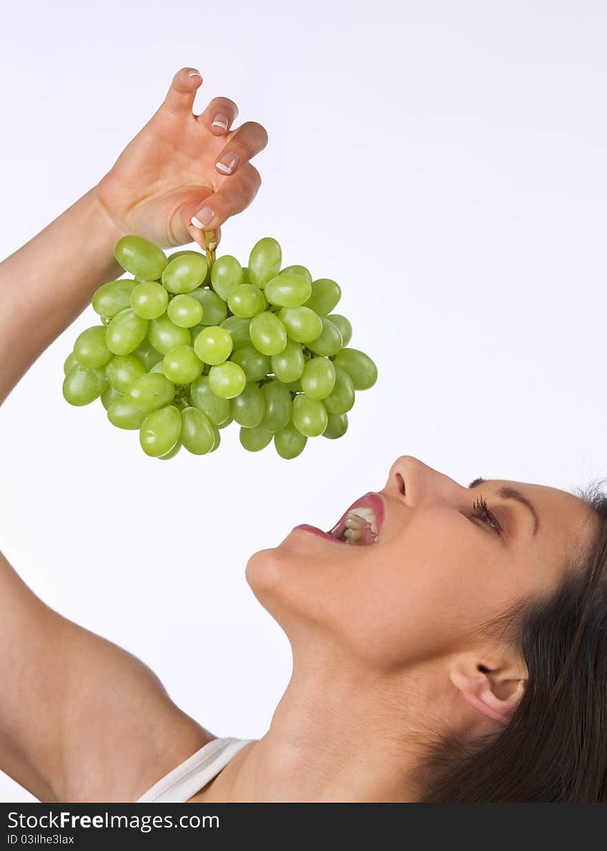 Young woman with fresh grapes