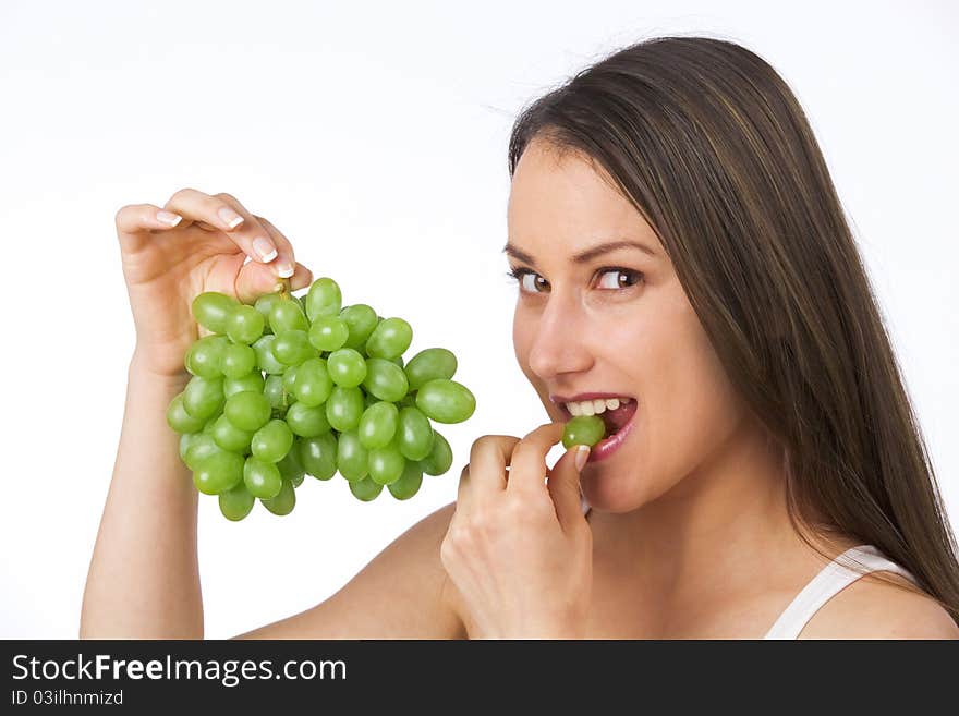 Young Woman Eating Grapes