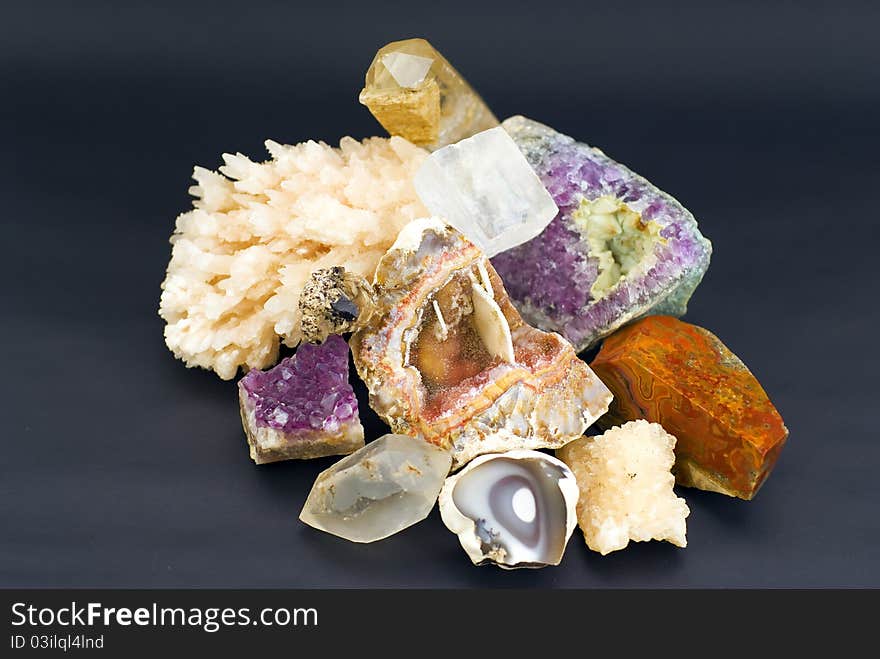 Composition of natural gem stones on a black background