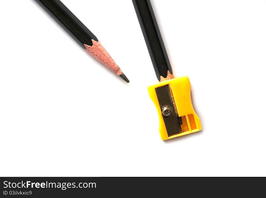 Pencil and sharpener on isolated background