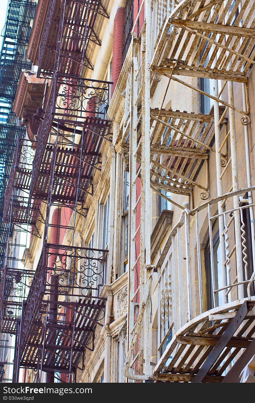 A jungle of wrought iron fire escapes. A jungle of wrought iron fire escapes