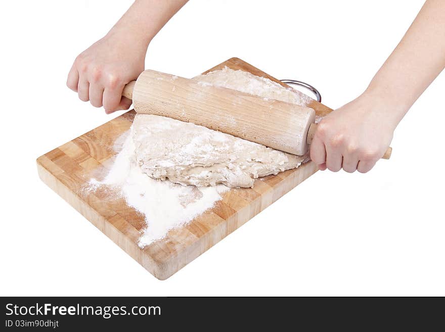 Studio-shot of hands roll out dough for bread, isloated on white. Studio-shot of hands roll out dough for bread, isloated on white.