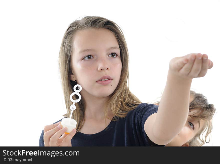 Beautiful children having fun with soap buuble. Beautiful children having fun with soap buuble