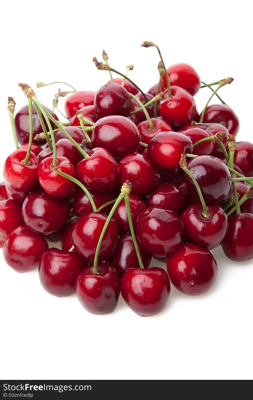 Fresh cherries isolated on white.