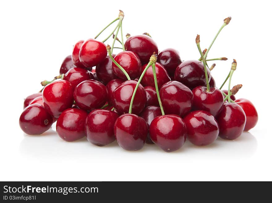 Fresh cherries isolated on white.