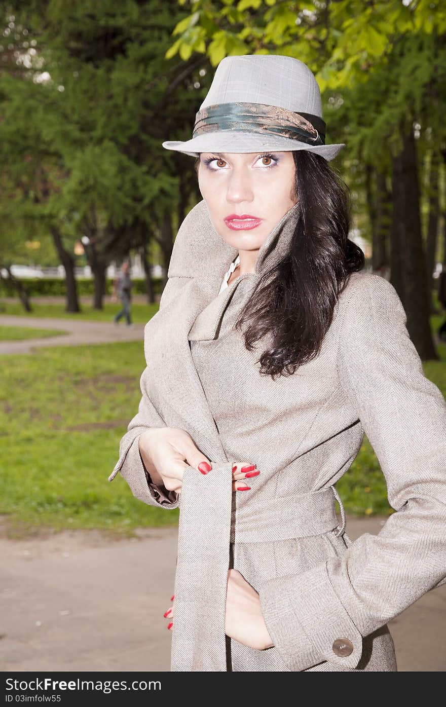 Astonished fashionable girl in the Spring Park