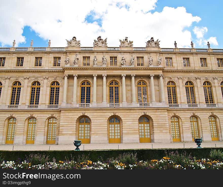 Castle of Versaille frontage with blue sky in the background , Landscape. Castle of Versaille frontage with blue sky in the background , Landscape