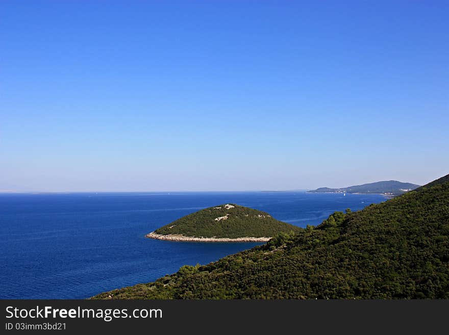 Islet in the sea near the coast of the island of Cres