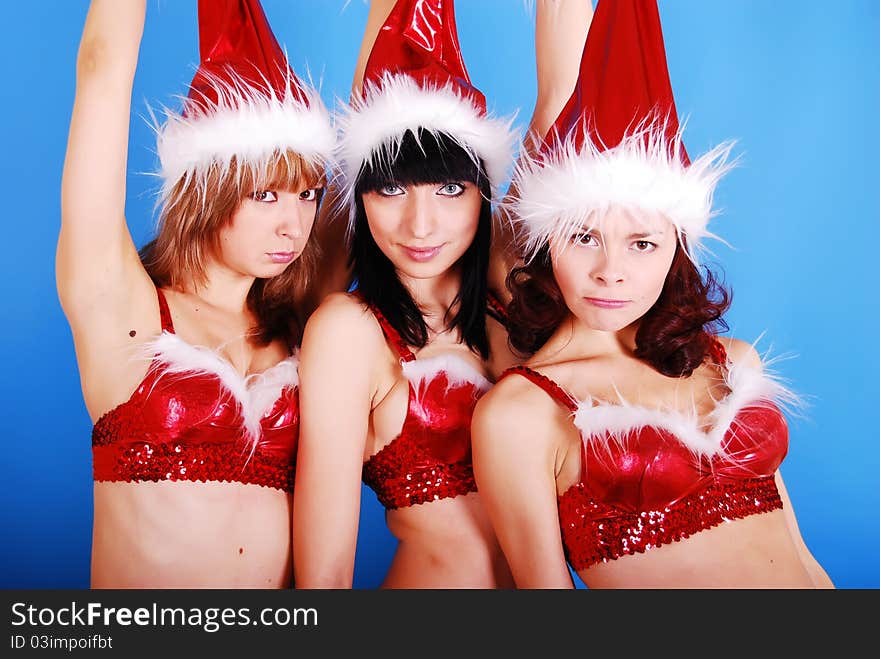 Portrait of a female models in santas cap.