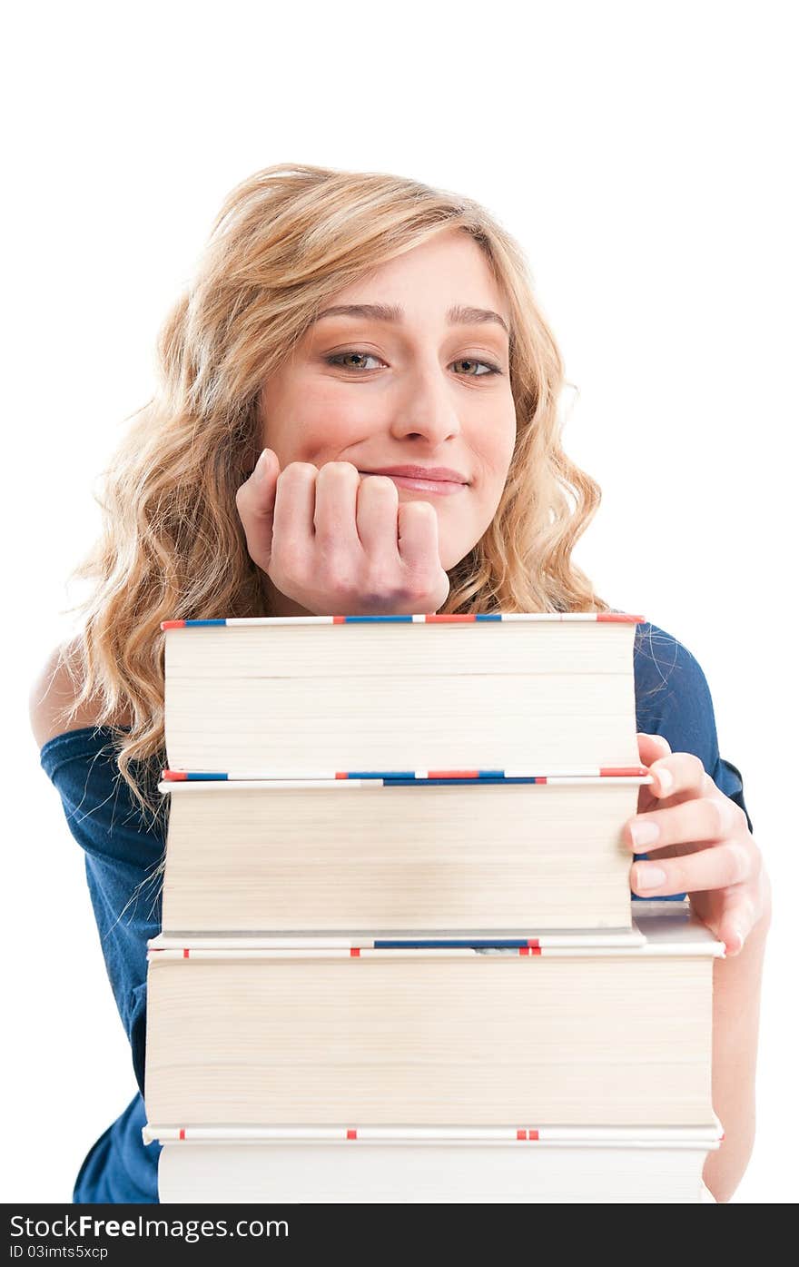 Beautiful young lady leaning on a stack of books and thinking at her future isolated on white background. Beautiful young lady leaning on a stack of books and thinking at her future isolated on white background