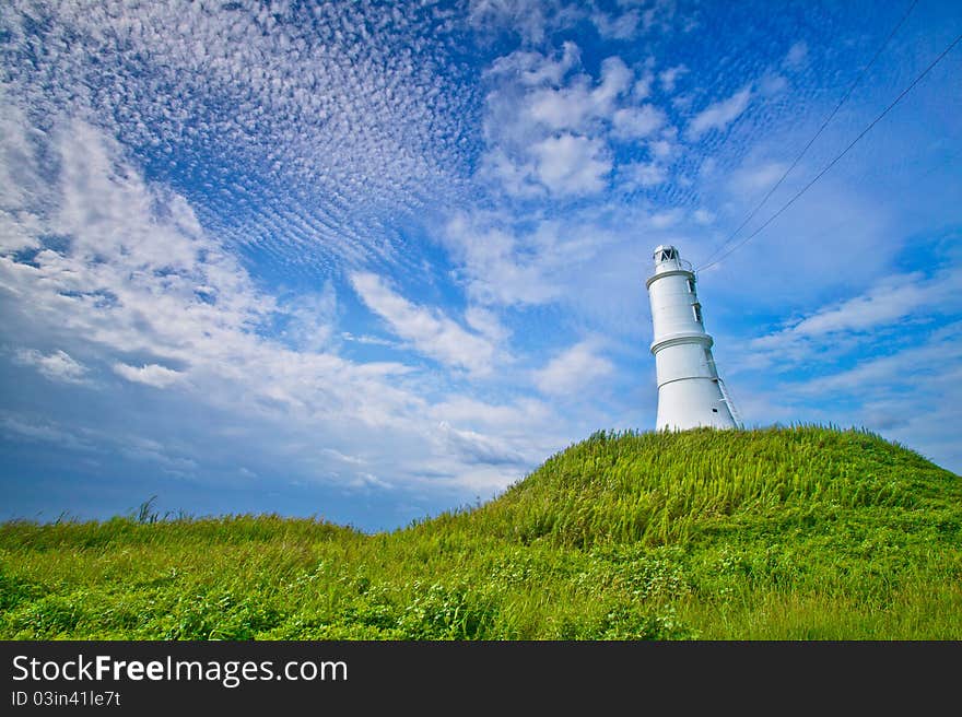 A lighthouse is a tower, building, or other type of structure designed to emit light from a system of lamps and lenses or, in older times, from a fire, and used as an aid to navigation for pilots at sea or on inland waterways. A lighthouse is a tower, building, or other type of structure designed to emit light from a system of lamps and lenses or, in older times, from a fire, and used as an aid to navigation for pilots at sea or on inland waterways.