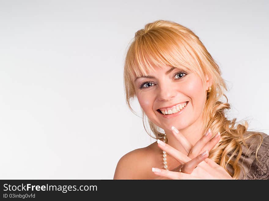 Portrait of a beautiful girl on a white. Portrait of a beautiful girl on a white