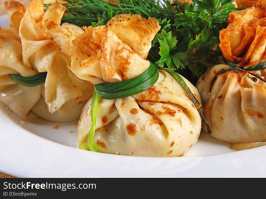 Stuffed pincakes. Restaurant. Close-up