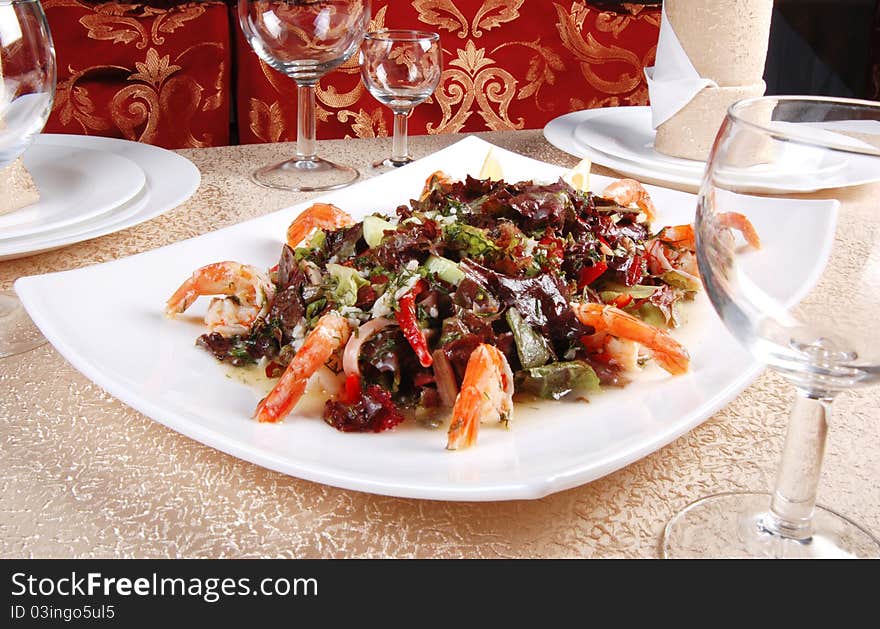 Shrimp salad on a table. Restaurant