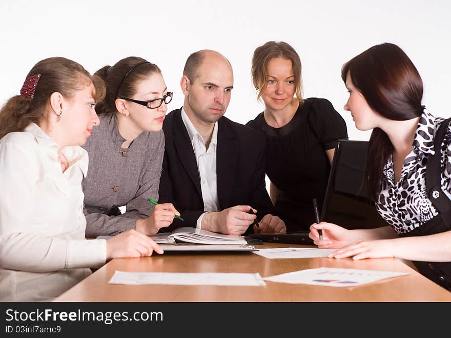 Meeting of a staff at the table. Meeting of a staff at the table