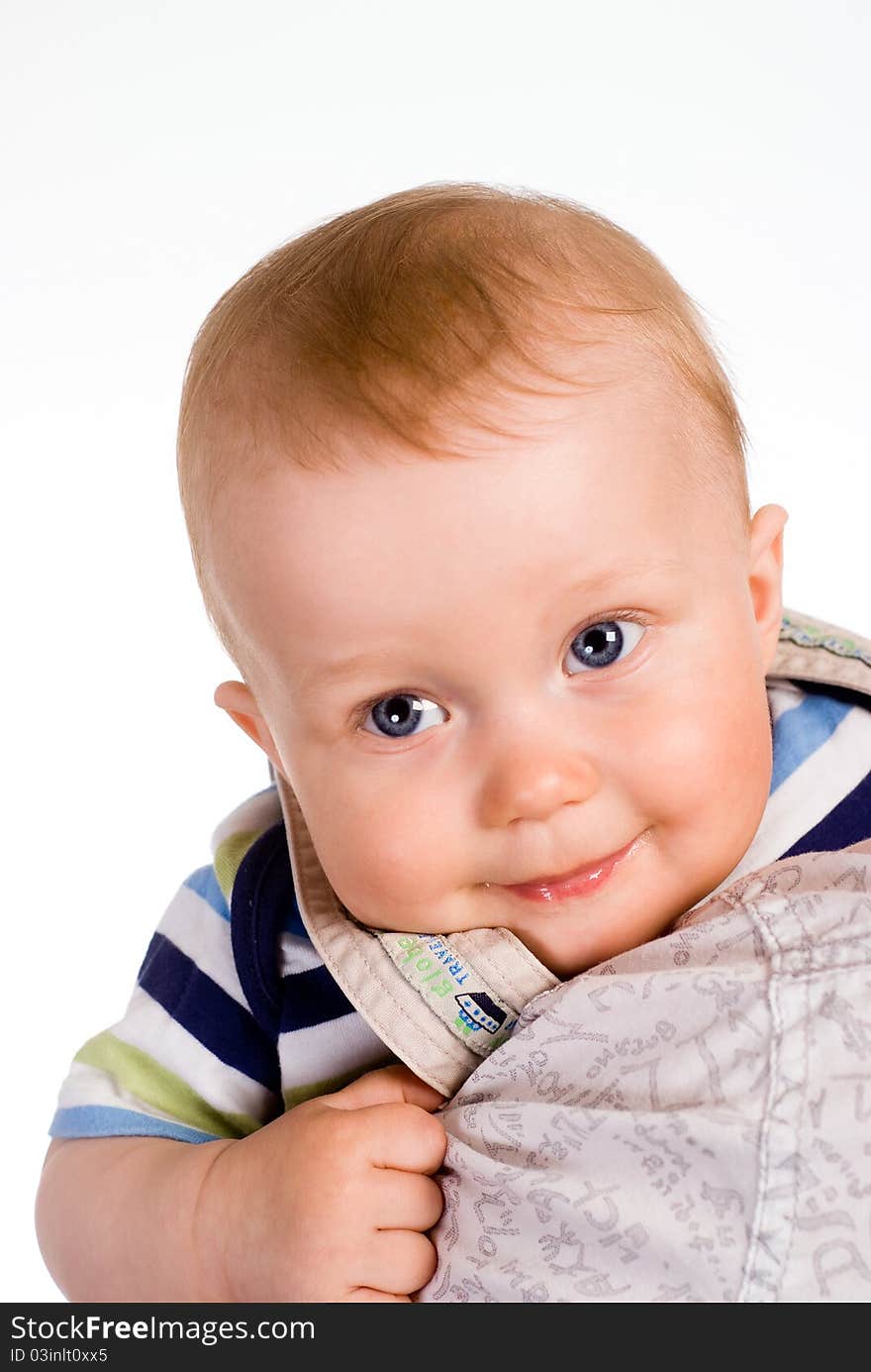 Wonderful baby smiling on a white background. Wonderful baby smiling on a white background