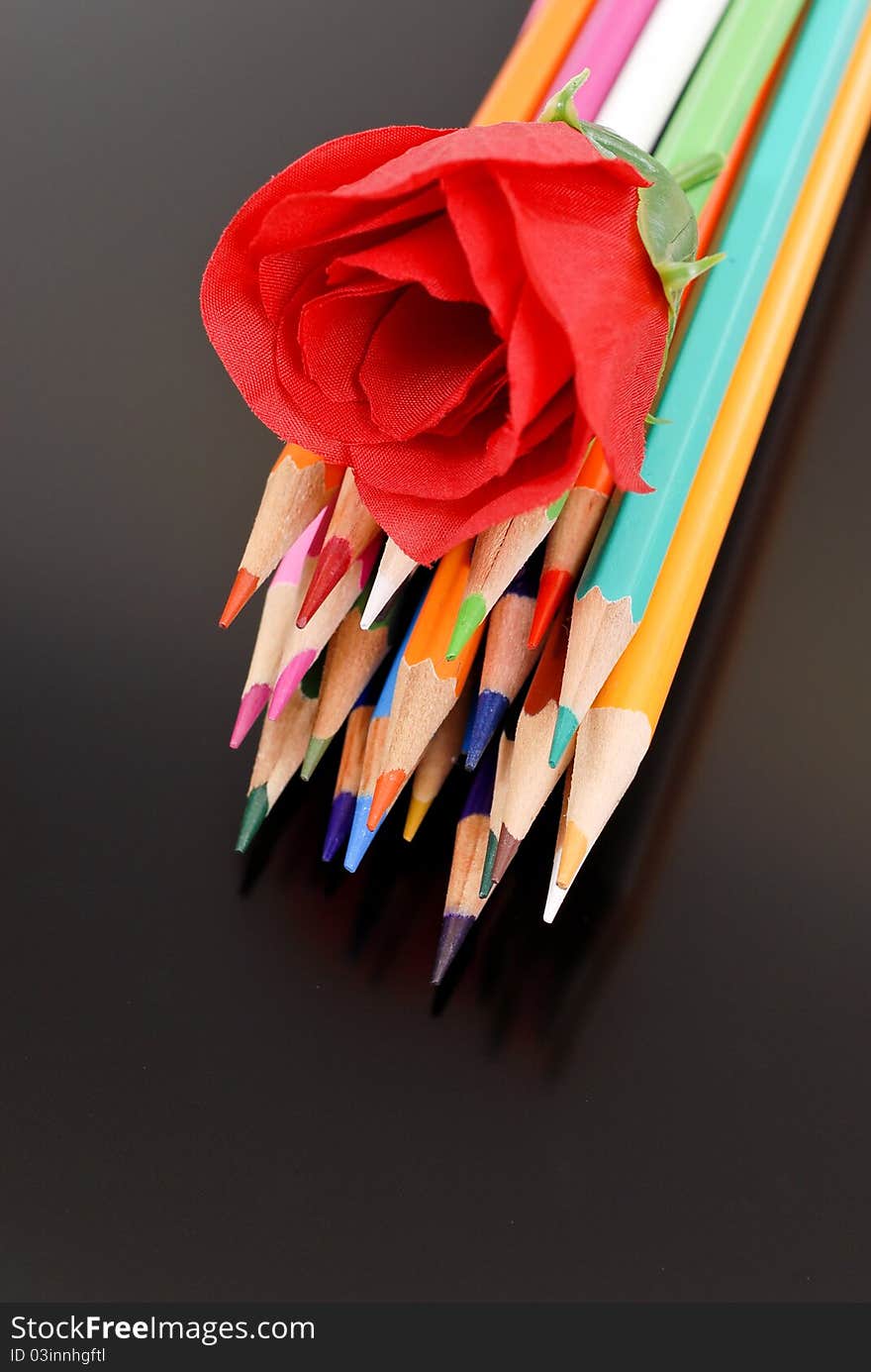 Colored Pencils With Fake Rose. Colored Pencils With Fake Rose