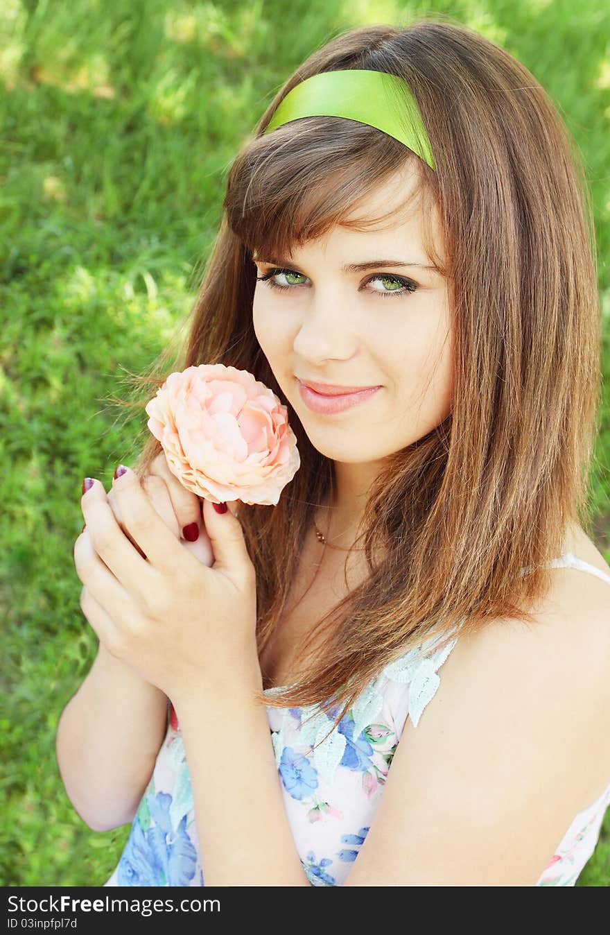 Beautiful girl with the tape holds the flower. Beautiful girl with the tape holds the flower